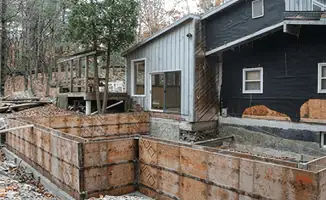 Prepared site with foundation forms for home remodeling and addition project in Mobile, AL