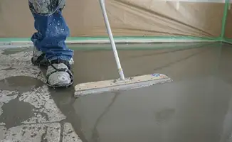 Uneven floor being professionally repaired in Mobile, AL